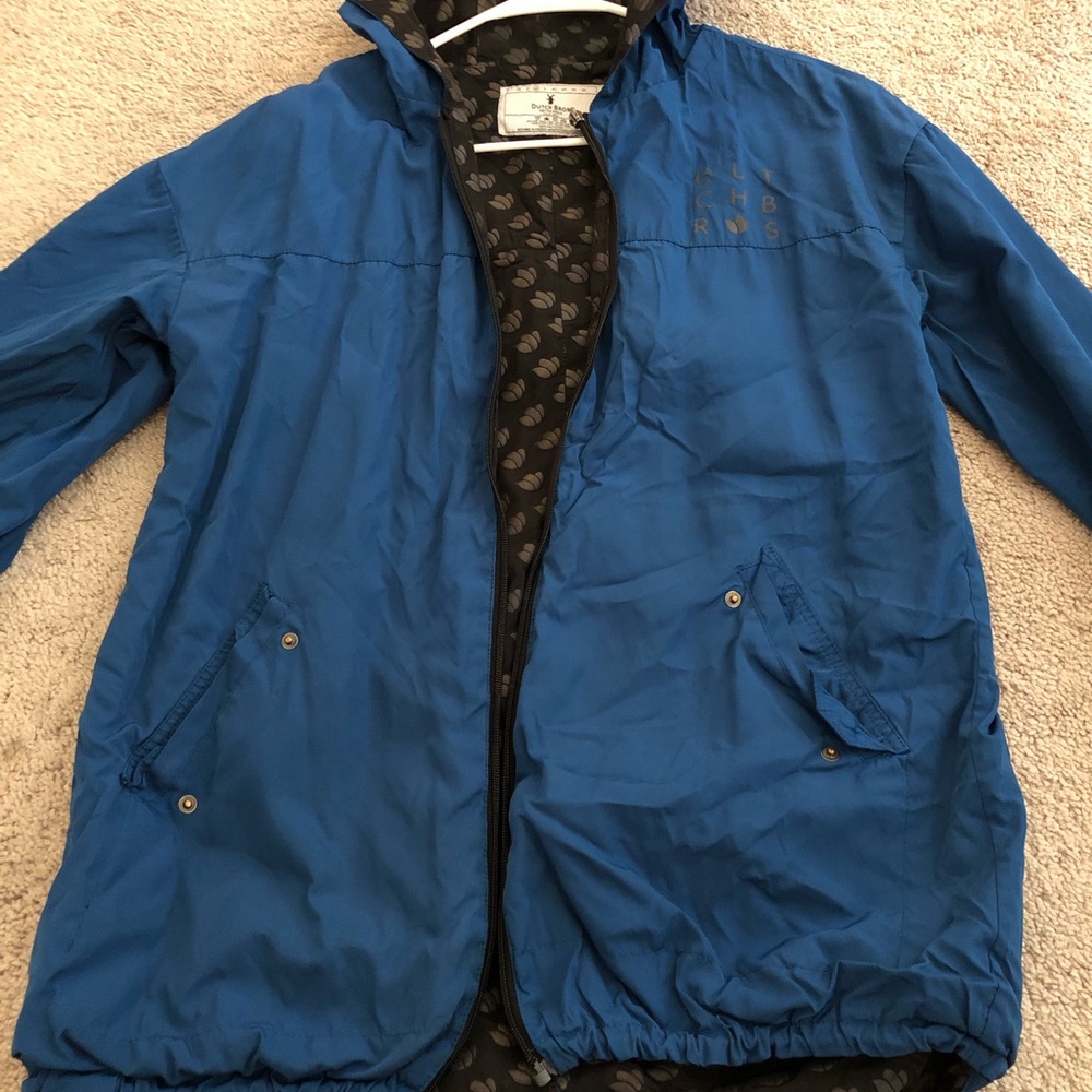 Dutch bros reversible rain jacket; broken zipper